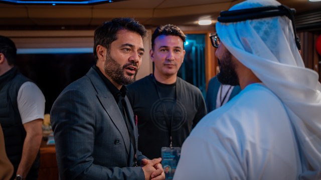 Guests in conversation at a Mobile Guild event