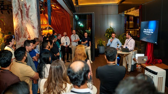 A speaker presenting to a Mobile Guild audience